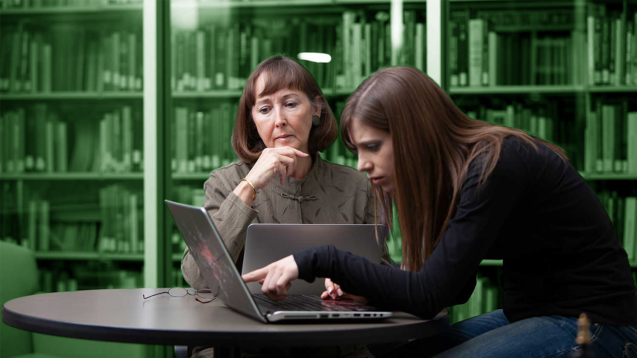 Joyce Kinkead with a student