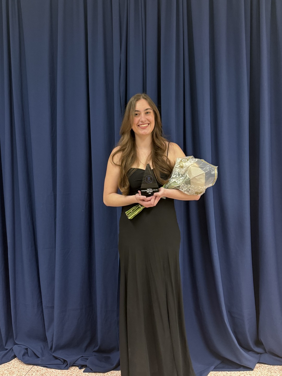 ella stott accepts award