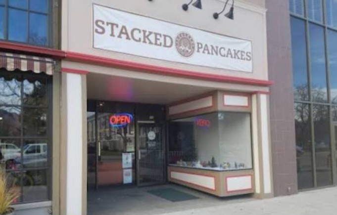 Stacked Pancakes storefront sign.