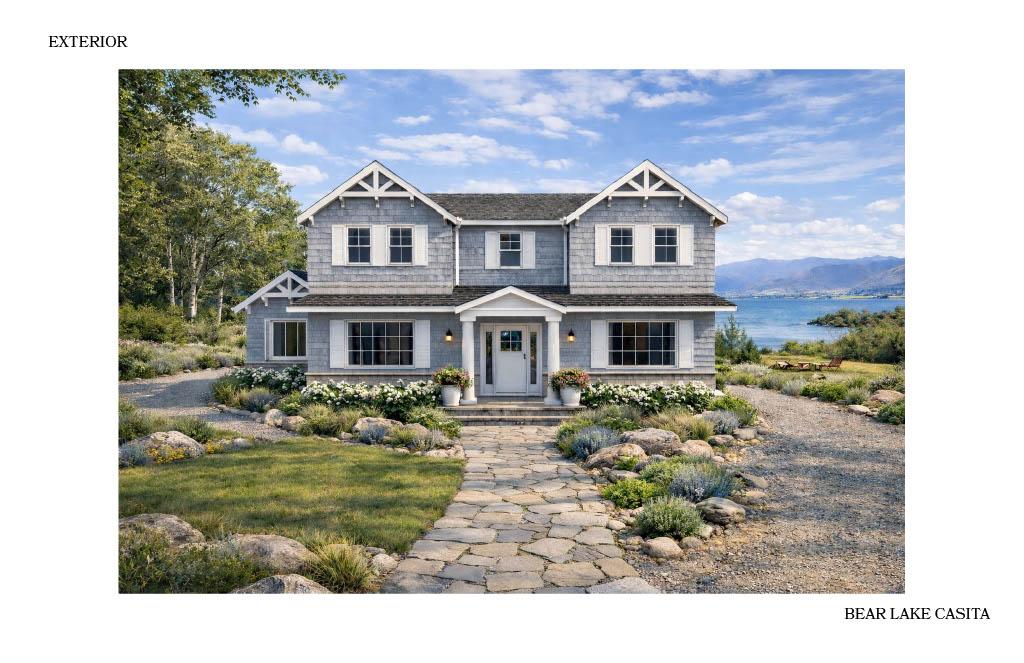 Exterior rendering of the Bear Lake Casita showing a two-story shingle-style home with a central entry, landscaped walkway, and views of the lake and surrounding mountains.