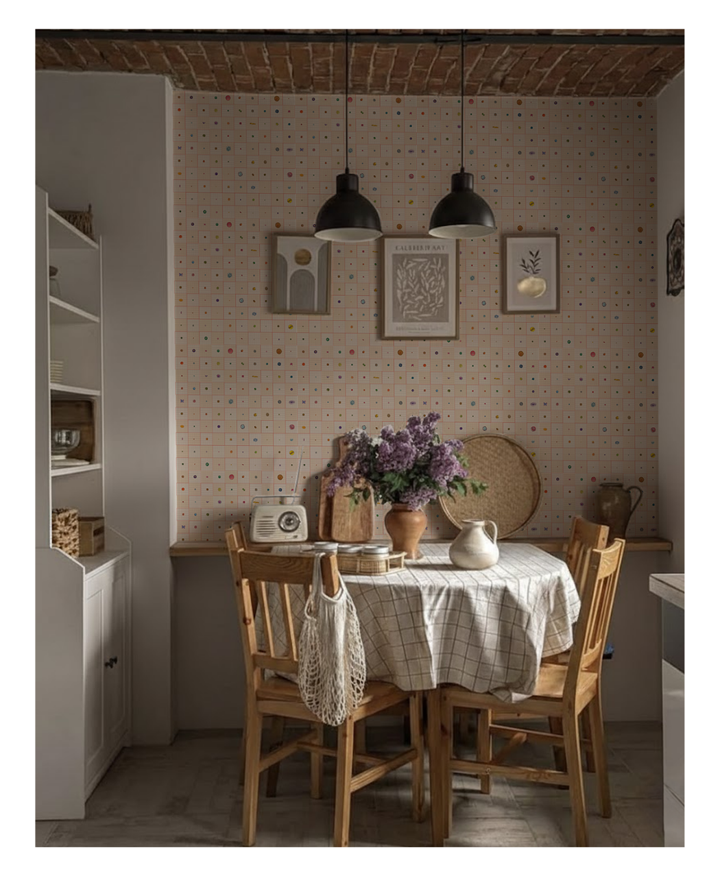 A vignette of the second wallcovering:
The Collection, put on the wall of a
dining room, with a round table with a
cloth on top, two pendants, and four
wood chairs.