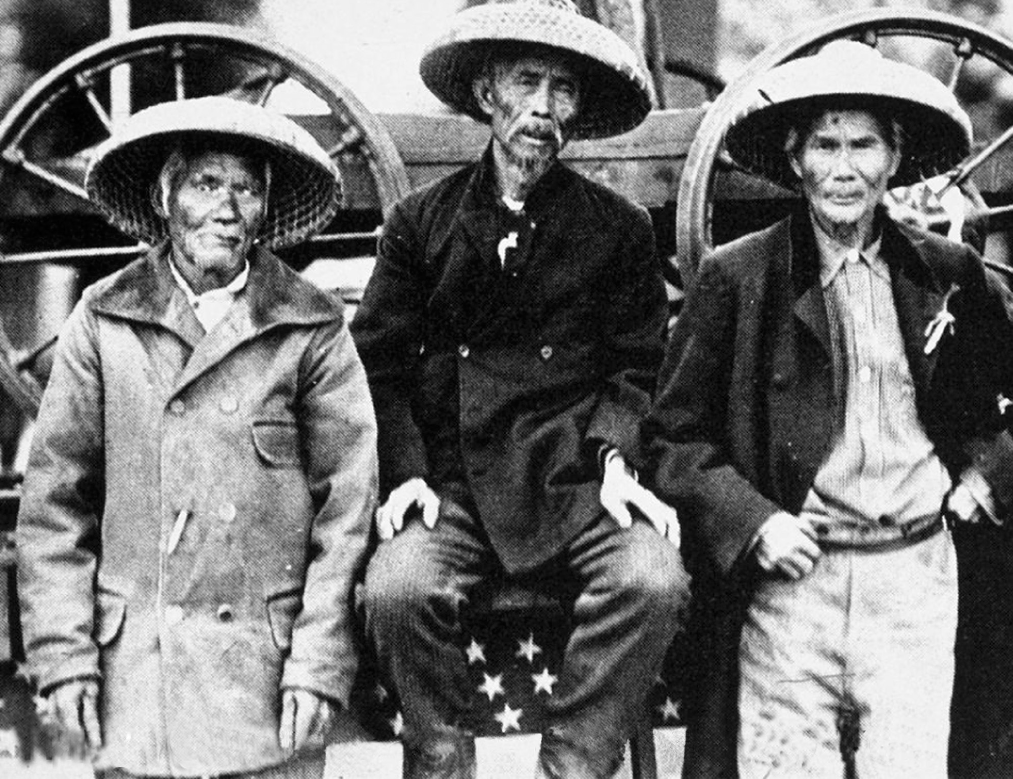 Three Chinese railroad workers.