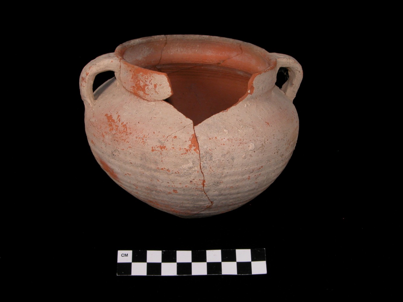 A cracked pottery sample.