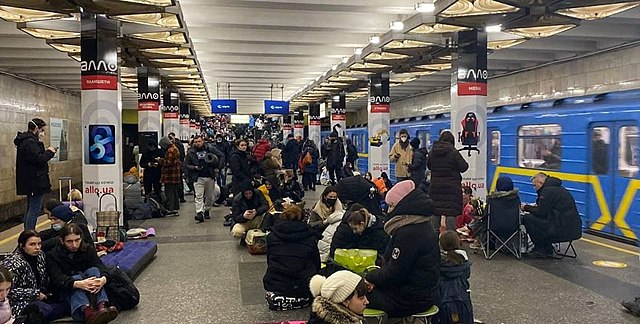 Ukranian civilians hide in a metro station during the Russian invasion.