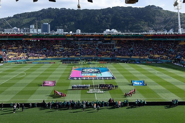 An aerial view of a soccer field with the United States and Netherlands teams before a match at the 2023 Women's World Cup.